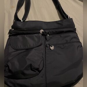 Travelon nylon shoulder bag with lots of compartments GUC